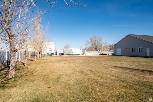 View of yard with fence | Image 54