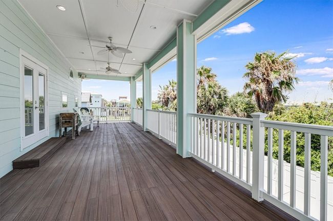 Covered upstairs deck overlooking the pool | Image 20