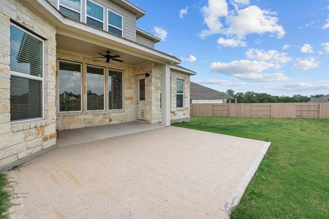View of patio with ceiling fan | Image 35