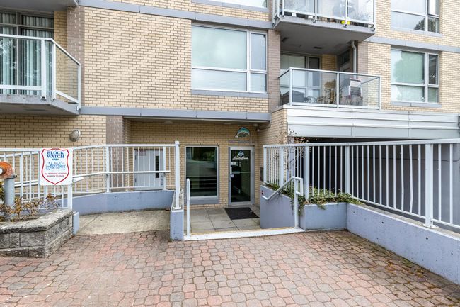 View of exterior entry featuring brick siding | Image 28