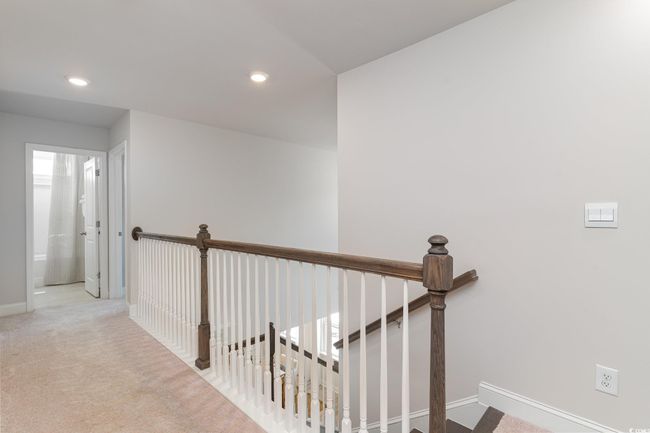 Corridor featuring an upstairs landing, recessed lighting, and carpet | Image 14