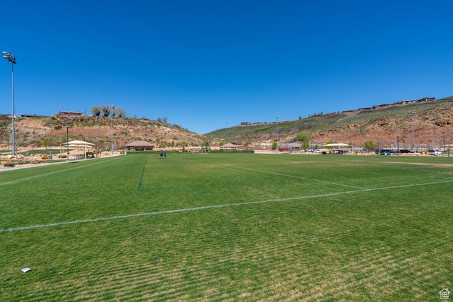 View of community featuring a sport area and a mountain view | Image 78