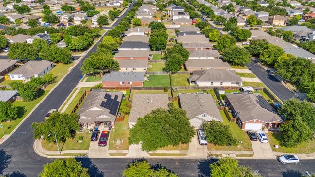 Aerial view featuring property with large tree canopy | Image 34