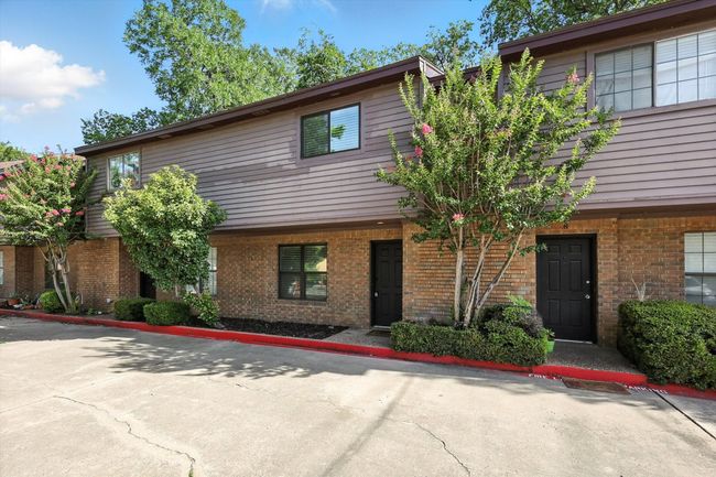 Townhome / multi-family property featuring brick siding | Image 4