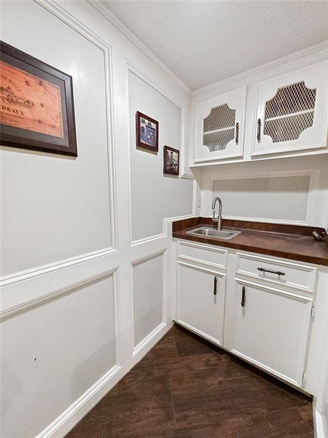 Wet bar is ready for morning perk-ups or evening wine-downs. Snacks can be stored here too. | Image 14