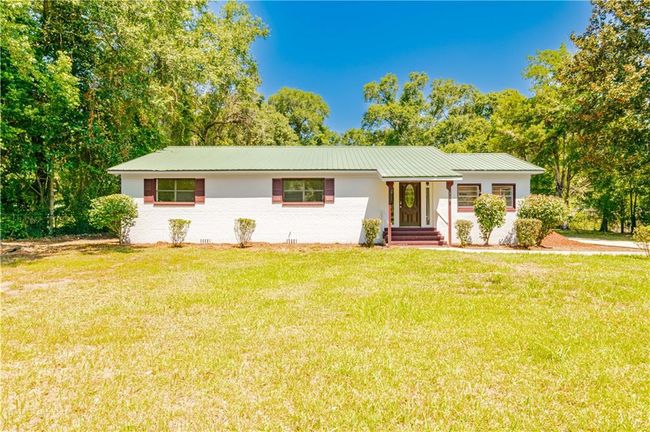 Ranch-style house featuring a front lawn | Image 8
