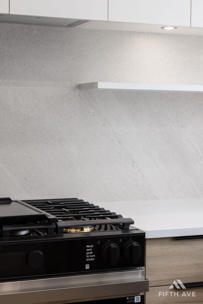 Kitchen view of gas stove | Image 18