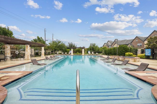 Community pool featuring a pergola and a patio | Image 27