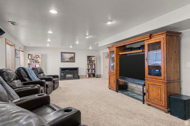 Carpeted family room featuring recessed lighting | Image 19