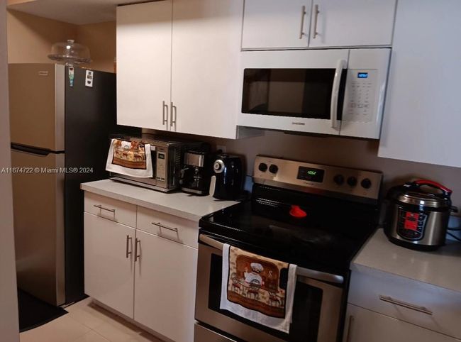 APT-108 - 18870 Nw 57 Th Ave, Condo with 2 bedrooms, 2 bathrooms and null parking in Hialeah FL | Image 19