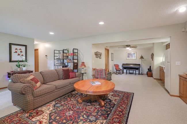 A look down to the extended family room where music instruments await! | Image 36