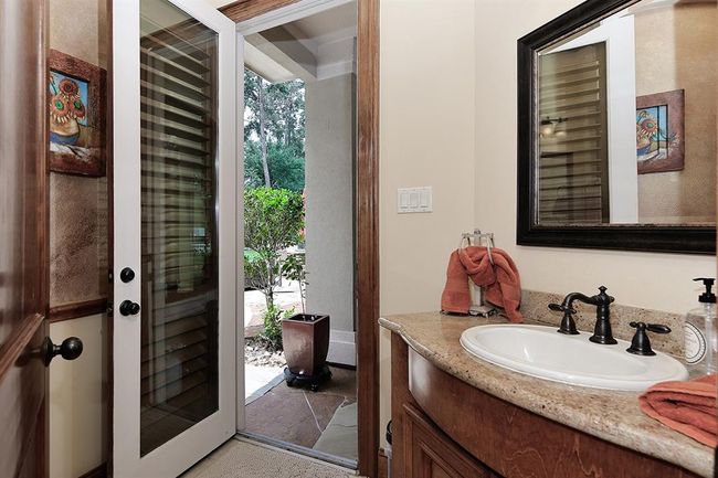 Convenient main floor, pool accessible, 1/2 bathroom | Image 24