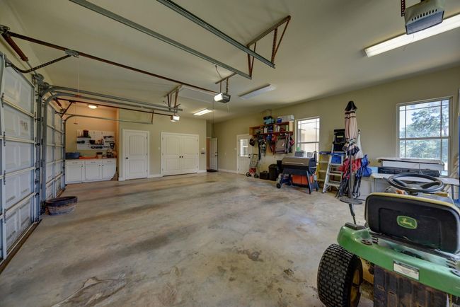 3 Car Garage with Potting/Work Bench and Storage Closet | Image 29