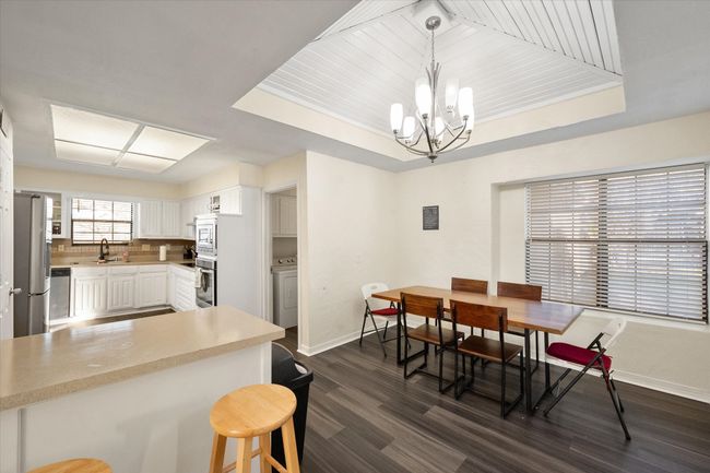 Convenient eat-in kitchen area! | Image 19