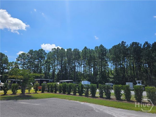 The HOA dues include a large area to store your boat, camper or RV with no additional HOA costs, based on lot availability. | Image 56
