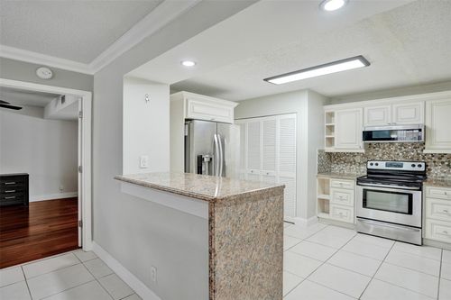 4q-12215 Royal Palm Blvd, Coral Springs, FL, 33065-3275 | Card Image