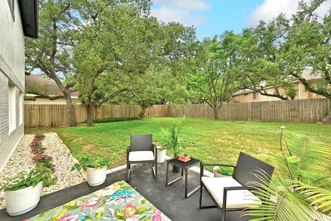 View of yard with a patio and a fenced backyard | Image 33