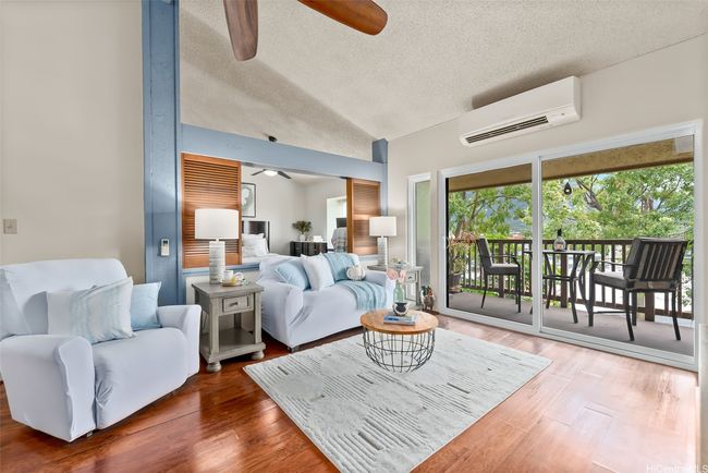High ceilings, lots of natural light, and large split AC unit | Image 6