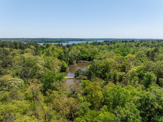 Aerial view featuring a water view and a wooded view | Image 7