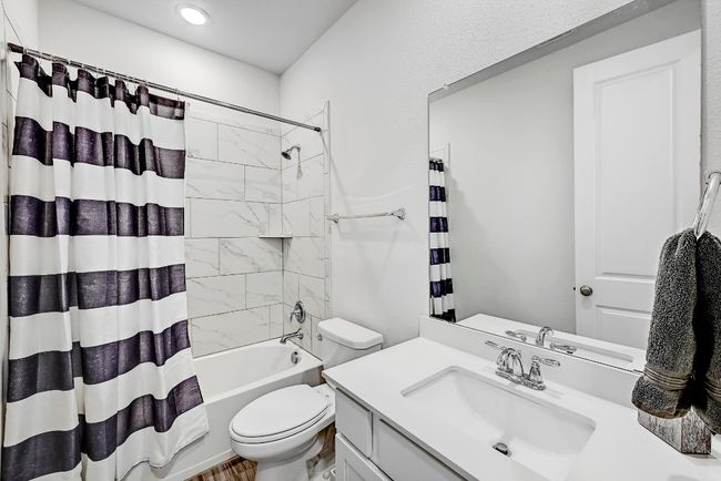 A well-appointed guest bathroom ensures that your visitors enjoy both privacy and comfort with modern features and thoughtful design. | Image 22