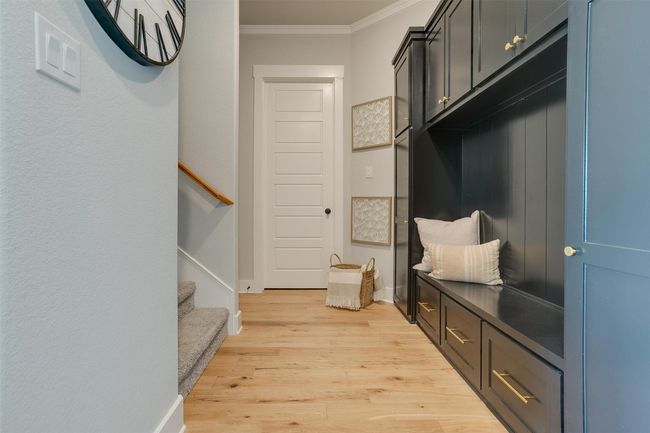 Mudroom with crown molding and light hardwood / wood-style flooring | Image 29