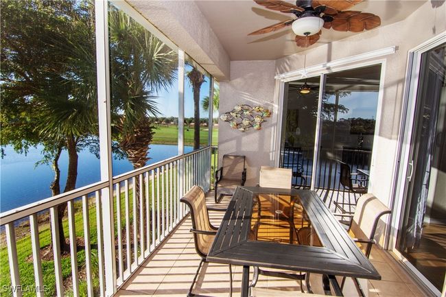 Seating for 6-8 for al fresco dining in your screened lanai. | Image 22
