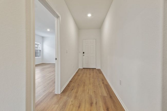 Hallway with light wood-style flooring and recessed​​‌​​​​‌​​‌‌​‌‌​​​‌‌​​‌‌​‌​​​​​‌ lighting | Image 6