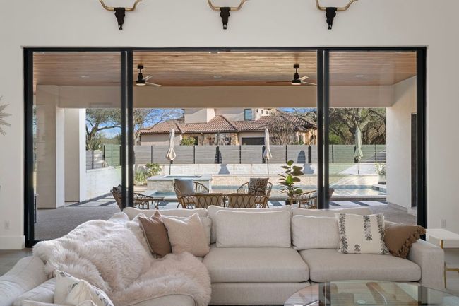 Living area with ceiling fan | Image 5