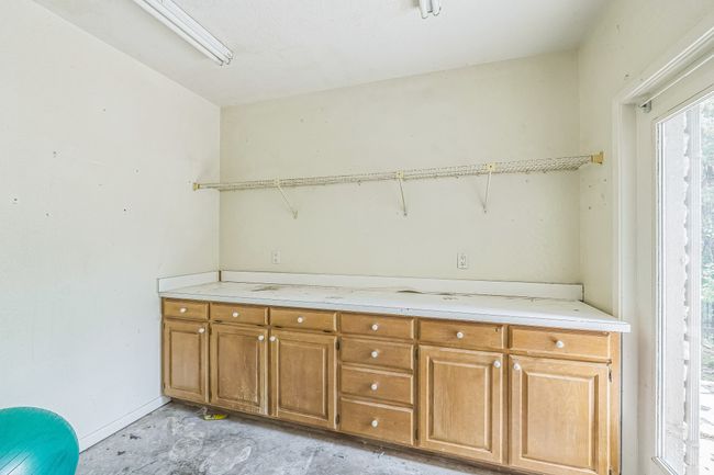 Washroom with baseboards | Image 32