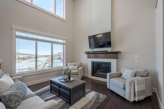 24 Bayside Link Sw, Home with 4 bedrooms, 3 bathrooms and 5 parking in Airdrie AB | Image 3