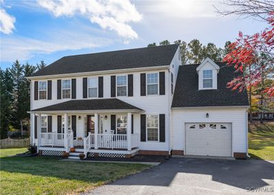 Vinyl siding, roof replaced, large lot, garage. | Image 1