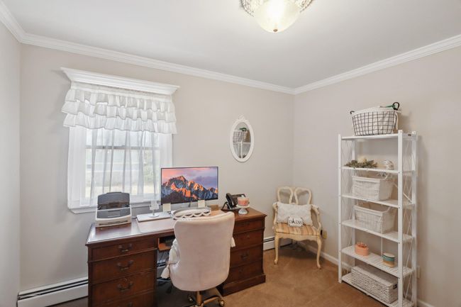 Full bathroom with recessed lighting, a baseboard radiator, crown molding, and a tub with jets | Image 29