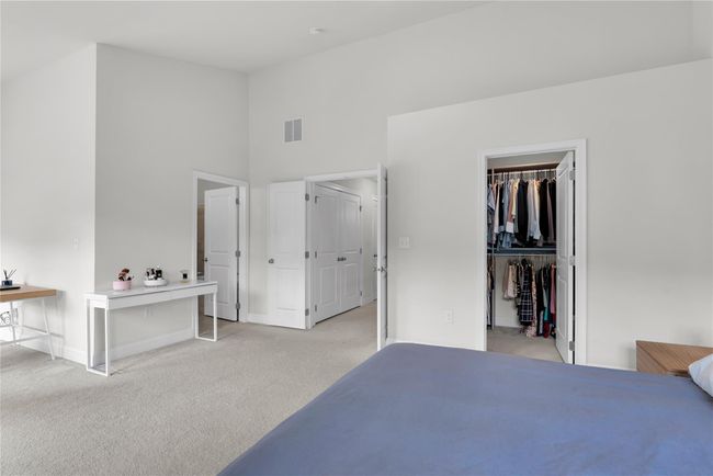 Bedroom with a walk in closet | Image 9