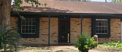 Enjoy your afternoons sitting on this front patio. | Image 2