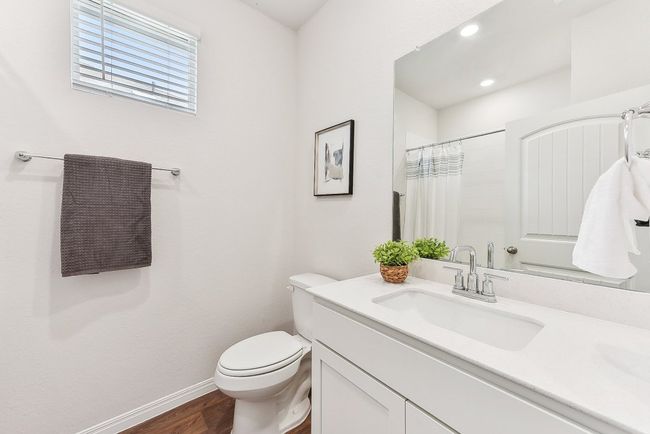 Fresh & Functional: Each bathroom features tasteful updates and modern finishes. | Image 16