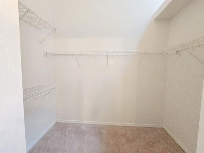 Walk in closet for master bedroom | Image 23