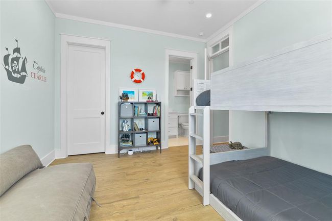 Bedroom suite includes a walk-in closet and en-suite bath | Image 34