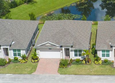 Aerial view of home and pond | Image 3