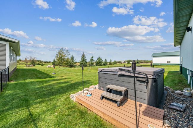 Relax in the hot tub while enjoying a sunset view! | Image 45