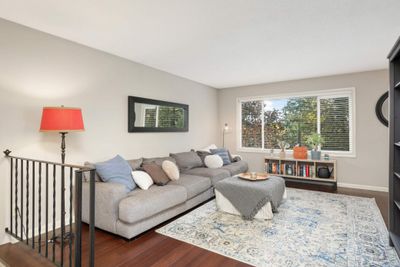 Spacious living room with lots of natural sunlight. | Image 3