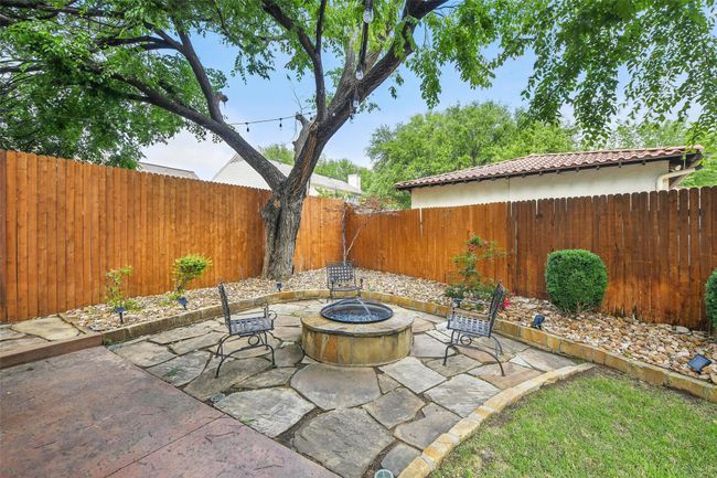 Enjoy evenings on your firepit patio. | Image 37