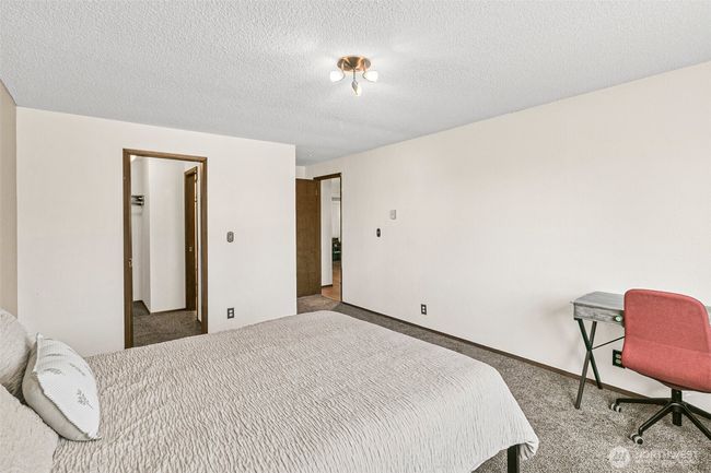 Primary Bedroom + Walk-In Closet. | Image 17