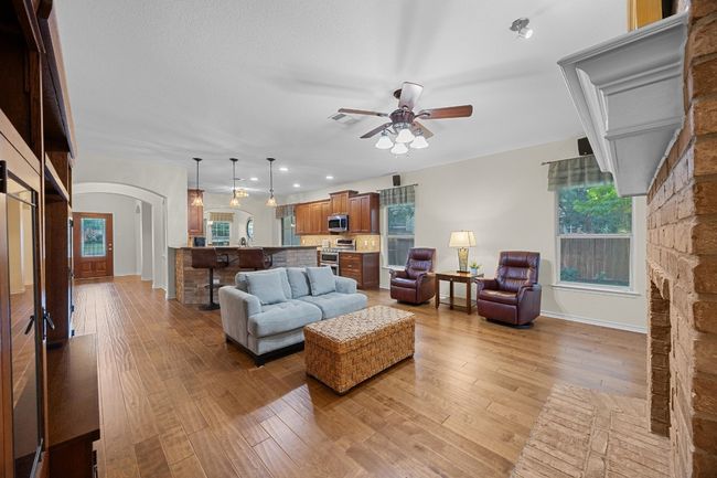 View from one corner showing the open floor plan. | Image 21