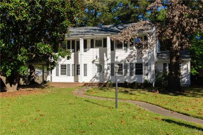 Colonial house featuring a front yard | Image 2