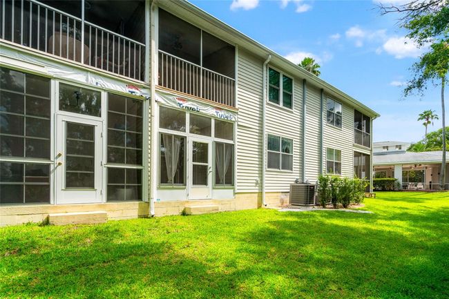 104 - 1936 Heron Cove Dr, Condo with 2 bedrooms, 2 bathrooms and null parking in Lutz FL | Image 26