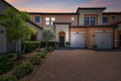 Lovely nighttime view of 10035 Crooked Creek Drive Unit - 102 | Image 3