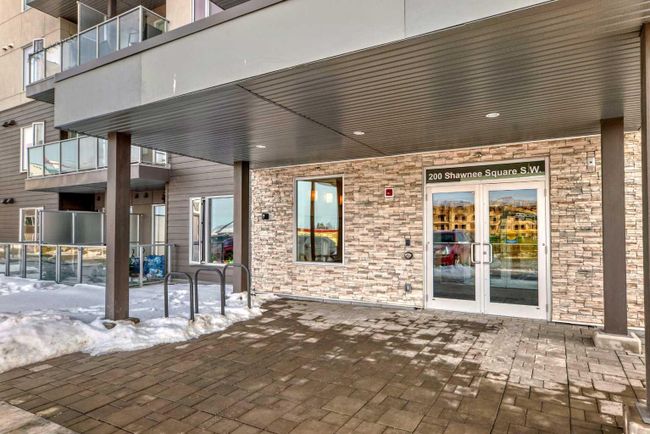 405 - 200 Shawnee Square Sw, Home with 2 bedrooms, 2 bathrooms and 1 parking in Calgary AB | Image 2