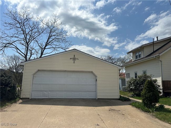 Detached garage with central air condition unit | Image 23