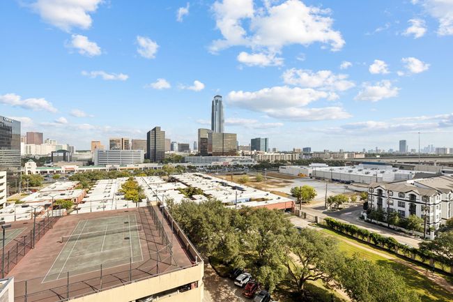 Two tennis courts sit atop the parking garage. | Image 29