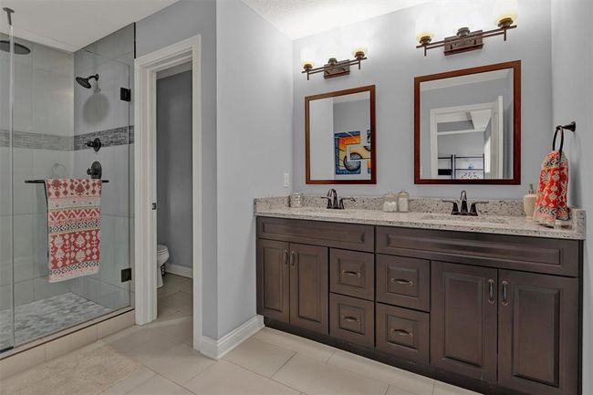 THE MASTER BATH FEATURES DUAL "RAISED" VANITY! | Image 21
